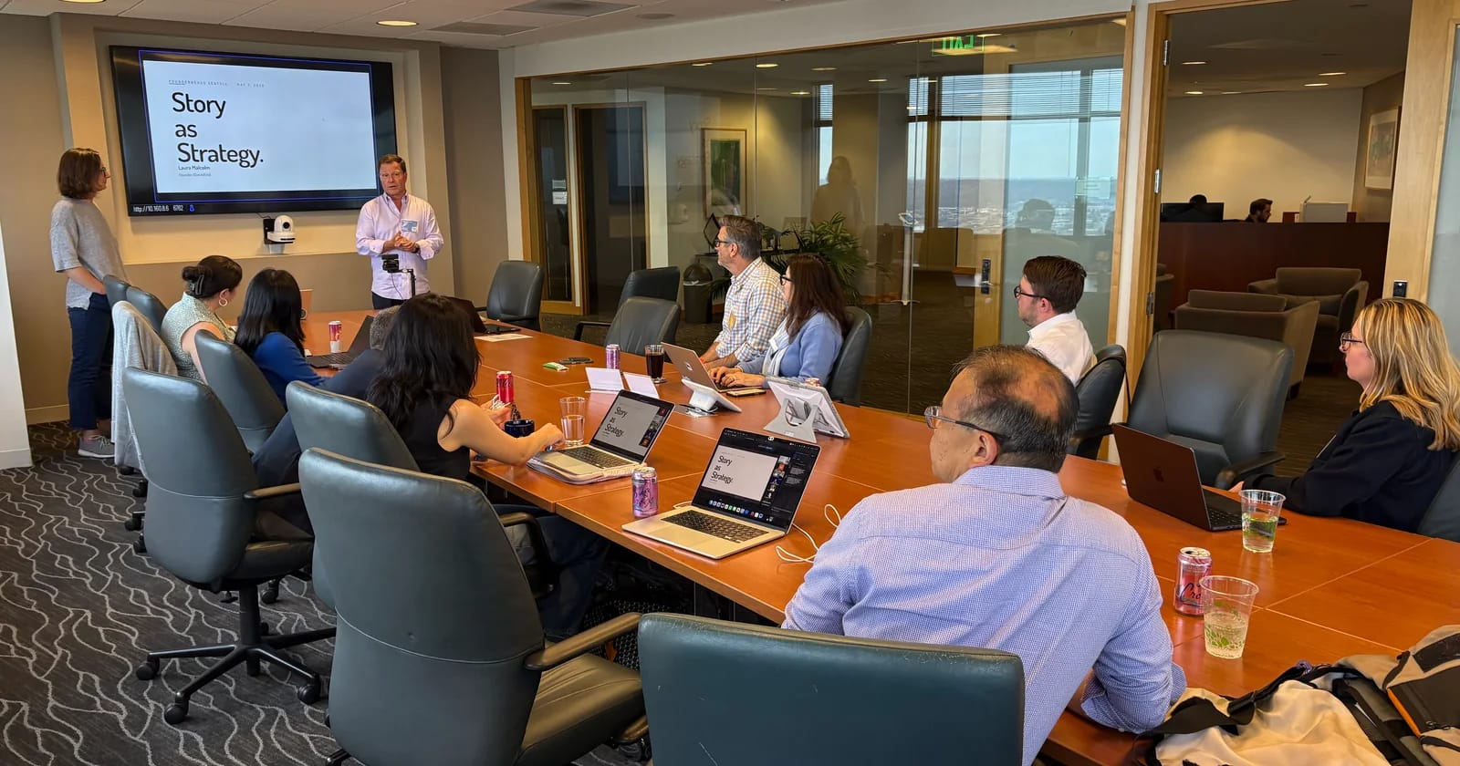 FounderNexus participants gathered around a conference table for a Story as Strategy session